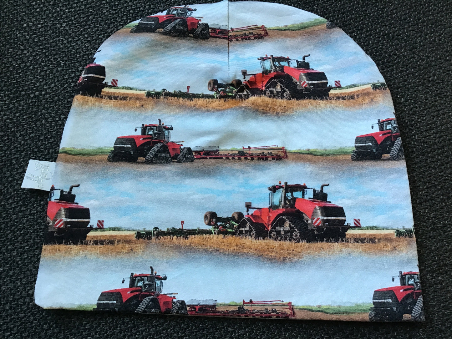 Rød beltetraktor Lue